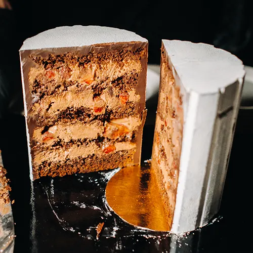 Q amazing-cakes-sliced-chocolate-wedding-cake-cake-2025-03-24-14-52-20-utc